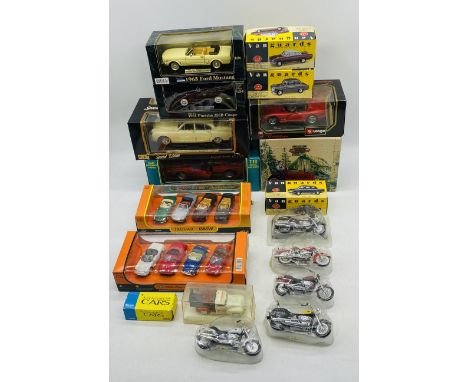 A collection of various die-cast vehicles including Burago, Vanguards, ERTL tractor, motorcycles etc