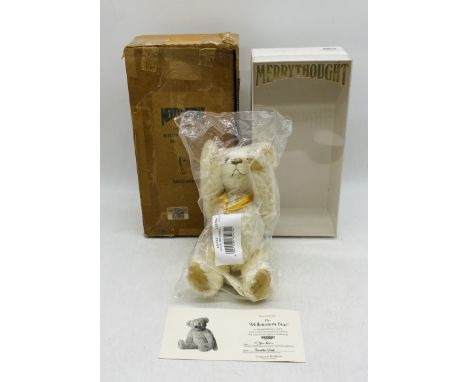 A limited edition Merrythought "The Millennium Bear" fully jointed teddy bear - with certificate, sealed and with original pa