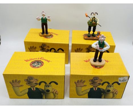 Four boxed Coalport Characters Wallace & Gromit ceramic figurines including "Cracking Toast Gromit", "Do Something Gromit", "