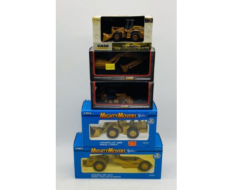 Five boxed ERTL die-cast construction vehicles including two Mighty Movers (Caterpillar 988B Wheel Loader & 631E Wheel Tracto