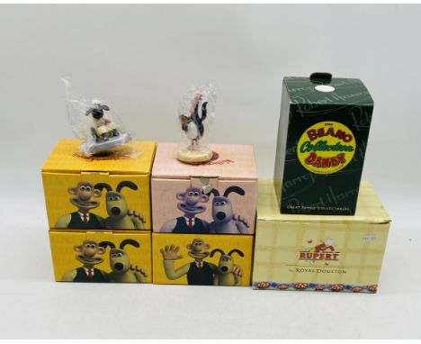 Four boxed Coalport Characters Wallace & Gromit ceramic figurines including two "Feather Disguise" and two "Shaun's New Coat"