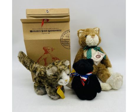 A boxed Steiff "Drolly" soft toy cat, along with a Boyds Heirloom Series "Chester L, Snicklepuss" cat and Merrythought "Hope 