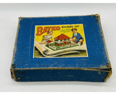 A vintage boxed Bayko Building Set with three additional roofs