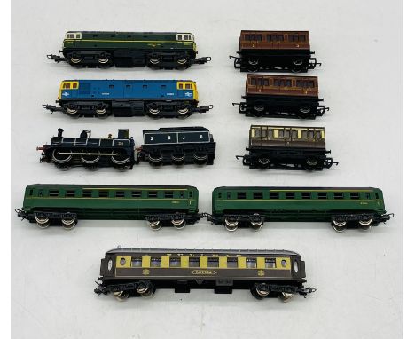 A collection of unboxed OO gauge model railway locomotives and carriages including two Lima diesel locomotives (D6514 & D6524