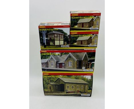 A collection of five boxed Hornby Skaledale OO gauge buildings relating to Skaledale East railing including the Goods Shed (R