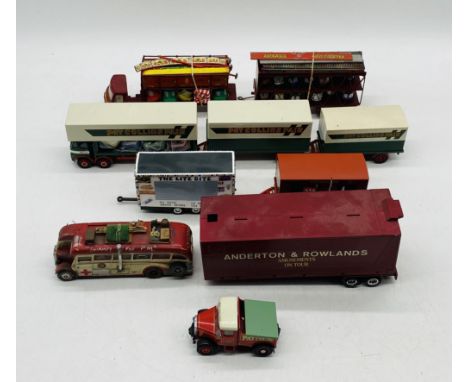 A collection of various unboxed fun-fair related die-cast vehicles including Corgi Pat Collins Fair dodgems with trailers, Co