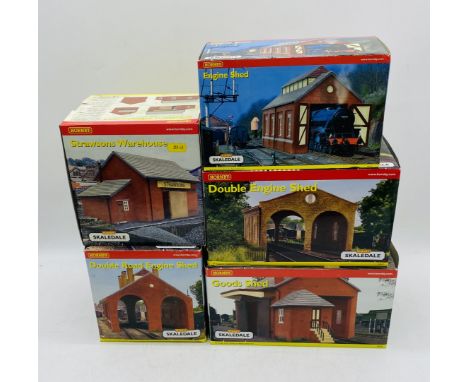 Five boxed Hornby Skaledale OO gauge sheds including Double Engine Shed (R8637), Goods Shed (R8582), Double Road Engine Shed 