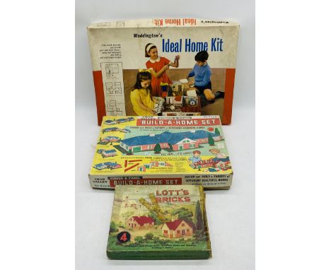 A boxed Chad Valley Build-A-Home set, along with a Lott's Bricks set and Waddington's Ideal Home Kit