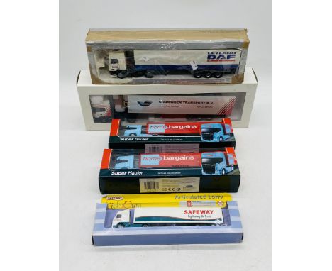 Five boxed articulated die-cast lorries including Eligor Volvo G.v.Dongen Transport lorry, Leyland DAF, two Welly Home Bargai
