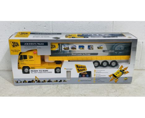 A boxed Impact JCB Cab & Trailer full function radio-controlled Events Truck (1:18 scale)