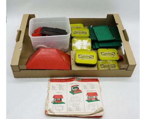 An unboxed vintage Bayko Building Set