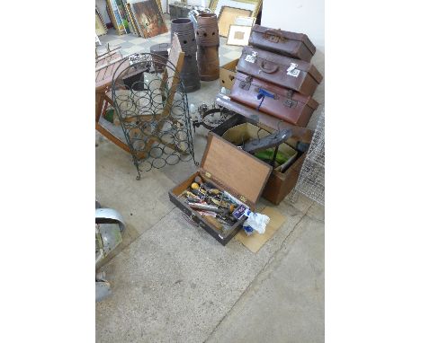 A tin trunk, coat hooks, wine rack, vintage telephone, etc.