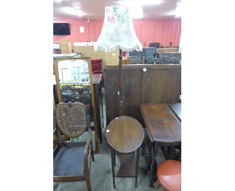 A beech standard lamp and a mahogany occasional table