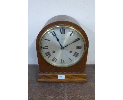 A German H.A.C. oak mantel clock