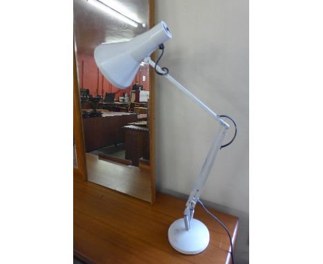 A white anglepoise lamp