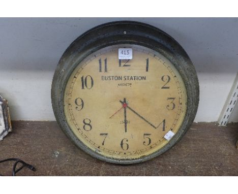A Magenta electric circular wall clock, the dial inscribed Euston Station