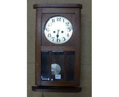 An oak wall clock