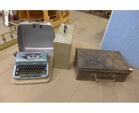 An Imperial typewriter, metal toolbox and another box