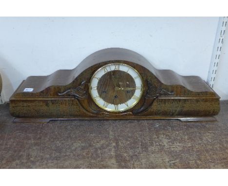 A Kenya Watch Co. Ltd. Urgos Winchester triple chime oak mantel clock