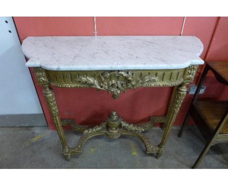 A 19th Century French carved gilt wood and marble topped console table