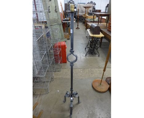 A French wrought iron standard lamp