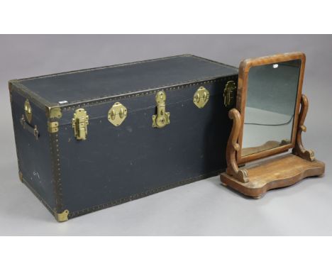 A blue fibre-covered travelling trunk with a hinged lift-lid, 40” wide x 19¾” high x 19¾” deep; &amp; a toilet mirror, 24” hi