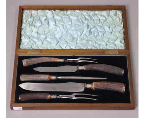 A set of five late 19th/early 20th century antler-handled carvers by Lee &amp; Wigfull of Sheffield, in fitted mahogany case;