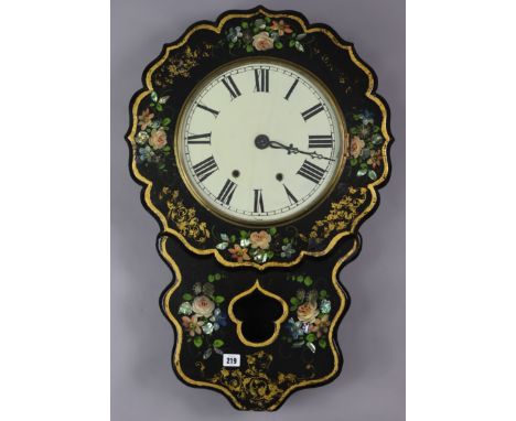 A Victorian japanned papier mache wall clock with striking movement, having black Roman numerals&nbsp;to the white dial &amp;