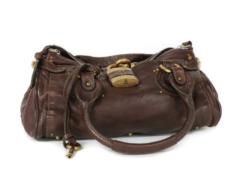 A Chloé 'Paddington' oxblood leather handbag,a grained calfskin leather exterior, dual rolled top leather handles, matt gold-