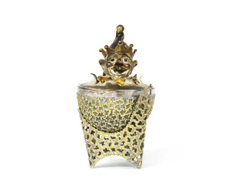 A silver gilt surprise egg, by Stuart Devlin, London 1972, the top lifting to reveal a clown's head on a spring emerging from