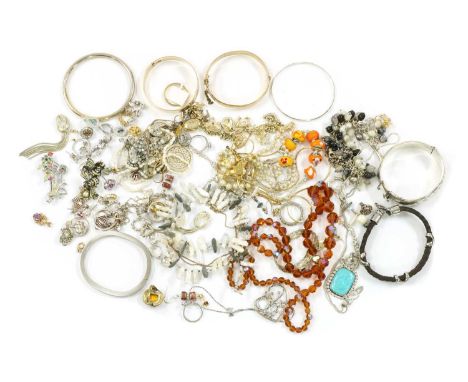 A quantity of silver and costume jewellery, to include a sterling silver oval hollow hinged bangle, with engraved decoration 