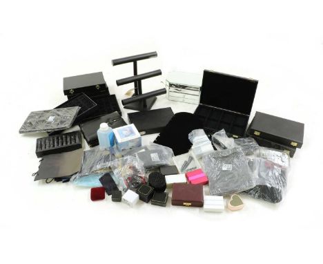 A large quantity of jewellery display props and boxes, to include ring stands, earrings stands, busts, travel cases and folds