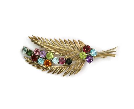 A gold assorted gemstone fern brooch, two fern motifs with assorted round mixed cut gemstones claw set between, to include bl
