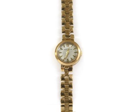 A ladies' 9ct gold Jaeger-LeCoultre mechanical bracelet watch, 16mm diameter, with a silvered dial, pennant hour markers and 