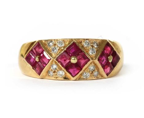 A gold ruby and diamond ring, with sets of four step cut rubies, rub and bead set, with brilliant cut diamonds grain set betw