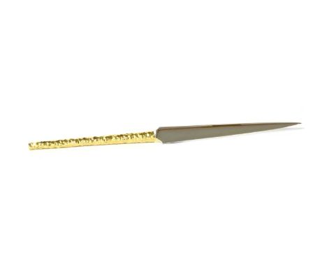 A silver gilt paperknife by Stuart Devlin, London 1976, with gilt facetted handle, in original presentation box, 23cm longCon
