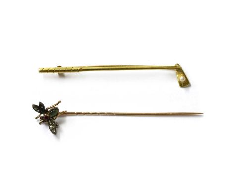 A gold and silver, diamond, ruby and cat's eye quartz bee stick pin, the finial in the form of a bee or fly, with rose cut di