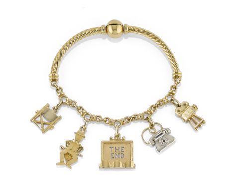 BRACCIALE CON PENDENTI POMELLATO in oro giallo con parte rigida e parte a catena con pendenti ispirati al cinema. Firmato Pom