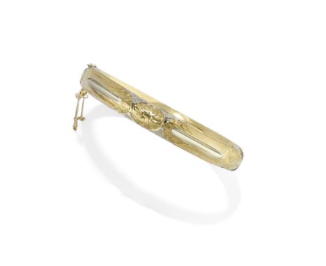 BRACCIALE RIGIDO IN ORO, 1920 CIRCA in oro bicolore realizzato a mezza canna con incisioni a motivi floreali. Gr 14,10 GOLD B