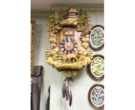 Good three-weight cuckoo clock, the case decorated with owl, deer and squirrel