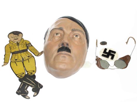 Hitler prop mask from Selling Hitler television programme, Hitler jointed card puppet, spectacles, badge and Swastika plaque