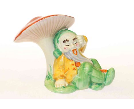 Clarice Cliff model of a gnome sleeping beneath a toadstool