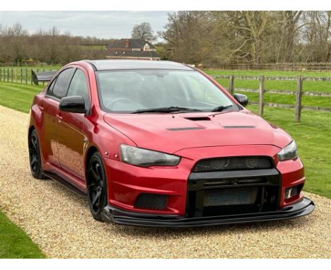 Topical, good looking EVO X GSR FQ300-SA that's been taken a step further. Finished in Damson Red with a charcoal cloth inter