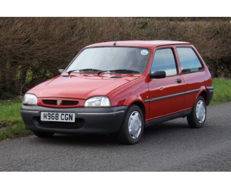 Very smart little fuel-injected Rover 100 in Flame Red with just under 14,700 miles from new. In December 1994, the R6 versio