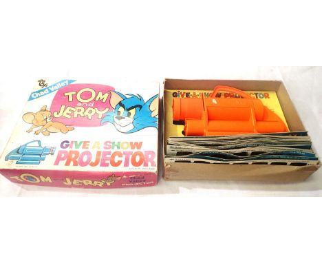 Chad Valley Tom and Jerry give a show projector, complete with seventeen slides, boxed and in fair to good condition. P&amp;P