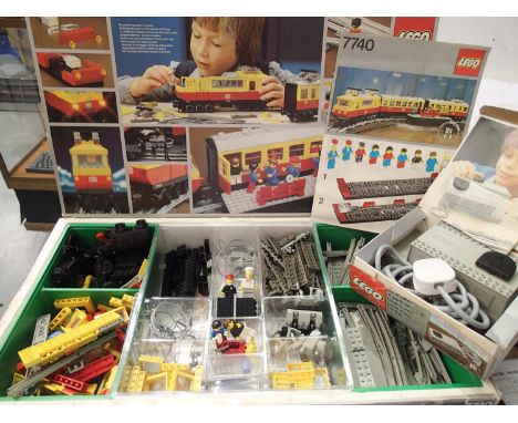 Lego train set 7740 with 12 volt transformer 7864, contents unchecked for completeness, box is fair. P&amp;P Group 1 (£14+VAT