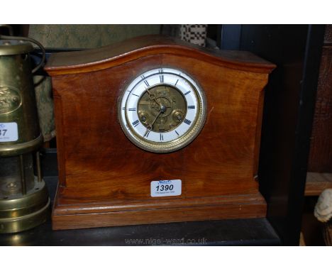 An Edwardian French Walnut finished Mantle Clock having domed top with applied moulded edges, the case having stop chamfered 