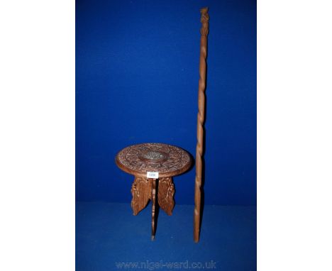 An oriental hardwood carved occasional Table of very small proportion, the circular top having central inlaid panel motif sur