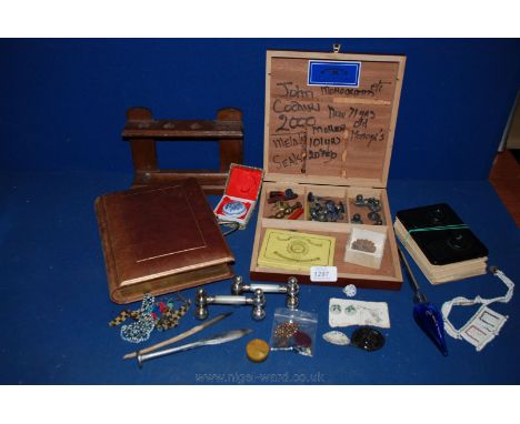A quantity of miscellanea including a Victorian photograph album, pipe rack, Mother of Pearl knife rests, camerascope, wax se