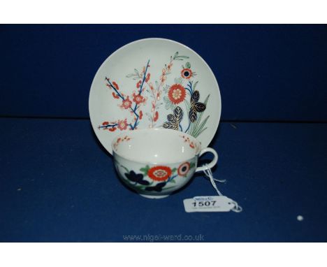 A rare Worcester porcelain Tea Cup and saucer, circa 1760, painted in the Kempthorne pattern of Prunus leaves, rusted in Kaki